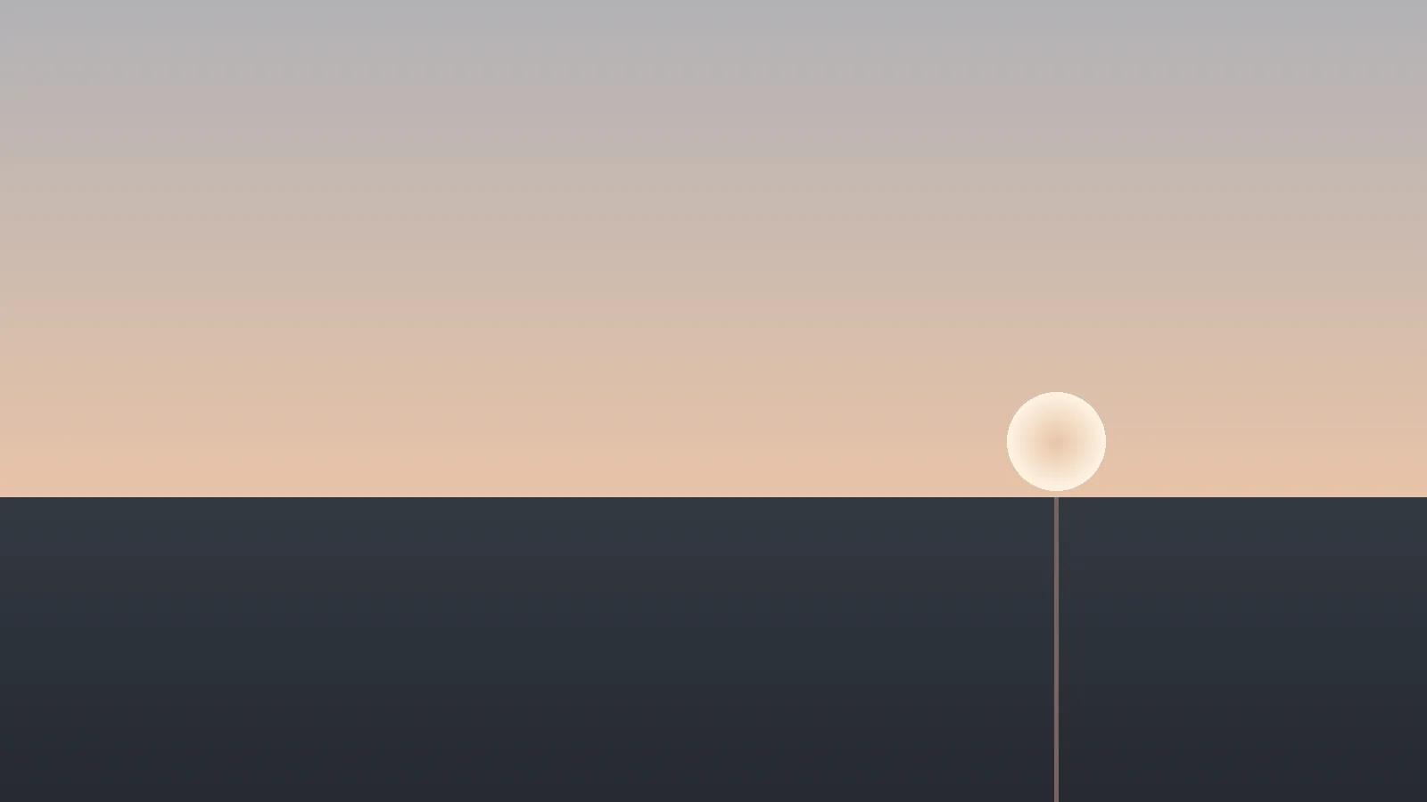 A man sits alone on the edge of a dock at dusk, elbows on knees, looking out over still water, the sky behind him pale and quiet.